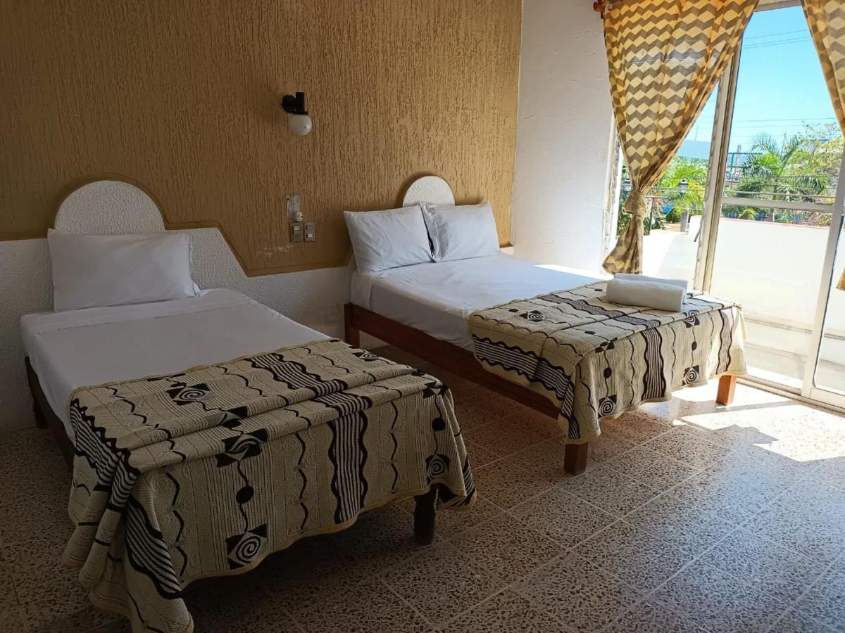Hotel Casa Juanita ปูแอร์โตเอสกอนดิโด ภายนอก รูปภาพ