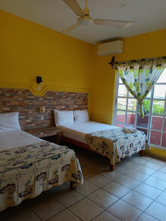 Hotel Casa Juanita ปูแอร์โตเอสกอนดิโด ภายนอก รูปภาพ