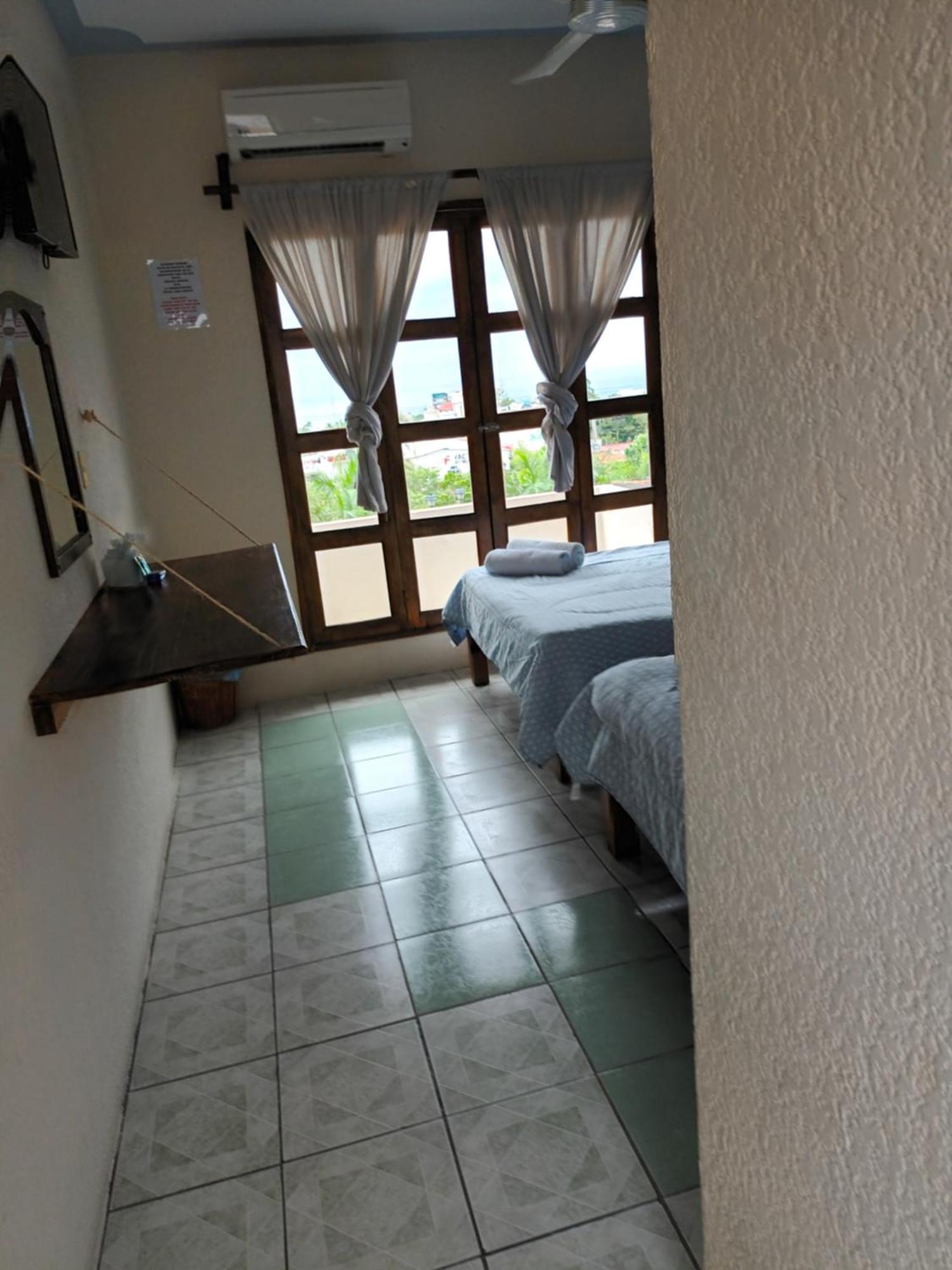 Hotel Casa Juanita ปูแอร์โตเอสกอนดิโด ภายนอก รูปภาพ
